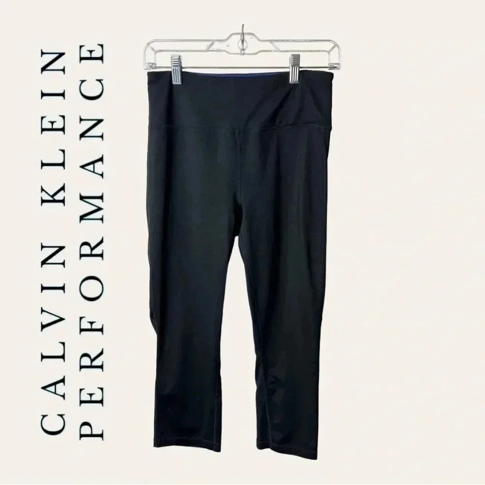 0762. CALVIN KLEIN PERFORMANCE CAPRIS LEGGINGS BLACK IN COLOR SIZE MEDIUM